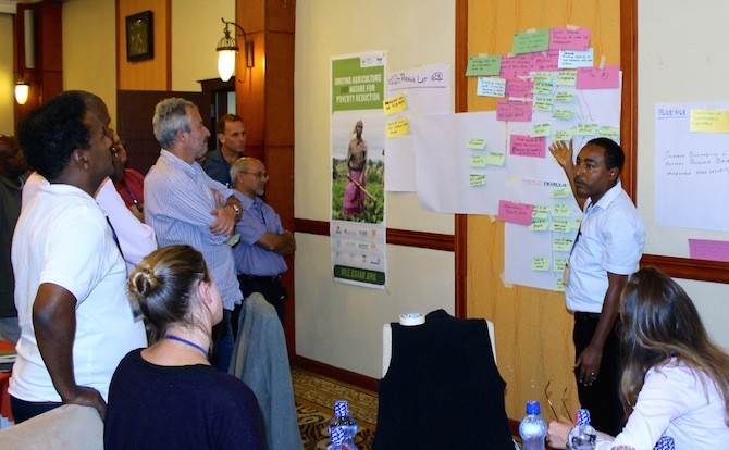 Writeshop participants work in groups based on sub-regions. The Blue Nile Group maps