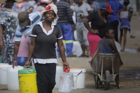 Residents queue for water at a distribution point in the farming town of Senekal in the Free State. 