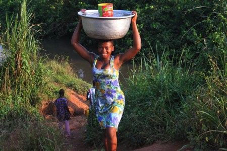 woman carrying water
