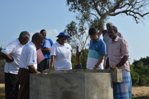 FAO officials and their local partners inspect the completed sluice of the Pookulam tanknd ulam_CTA and the Lead Technical Officer inspecting the completed sluice
