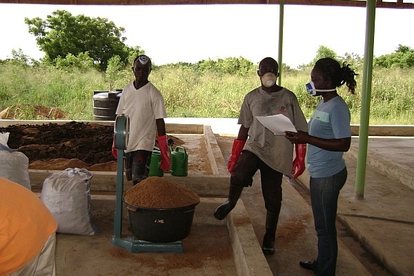 Ghana. Workers prepare compost samples of Fortifer, a pathongen-free organic fertilizer made using enhanced fecal waste. The pilot project is the first in West Africa under an innovative waste-to-food business model. Laboratory analysis in Ghana shows that Fortifer is a safe product and can improve agricultural yields by 20 percent to 50 percent compared with the use of inorganic fertilizers, while also maintaining soil health. Photo: Josiane Nikiema