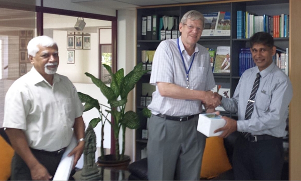 Jeremy Bird hands over the UAV data to Mr Palitha Udayakantha