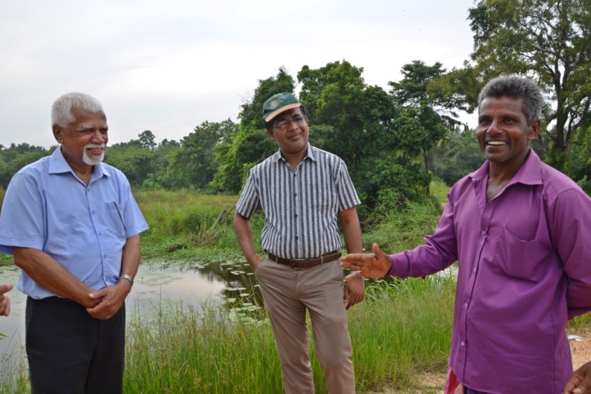 Weerarathna (right), head of the farmers association at Mawathawewa village in Anuradhapura District, North Central Province.