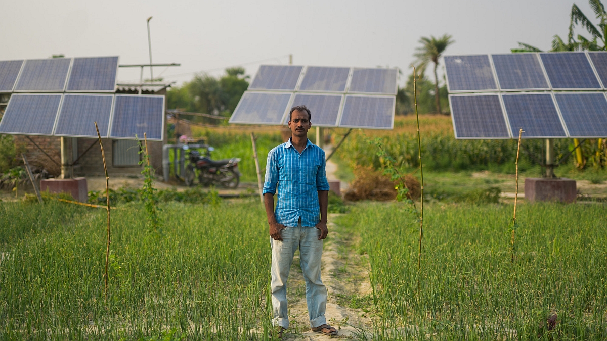 Vegetable farmer Yatin Kumar in front of his solar irrigation pump site in Chak Haji village in Bihar, India. Photo: Metro Media / IWMI