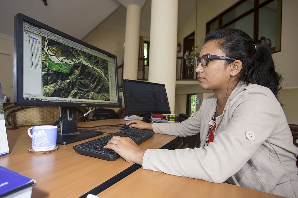 IWMI Research Officer working on water data in Kathmandu Nepal. Photo: Sharad Maharjan / IWMI