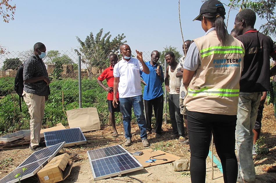 Farmers attending a solar irrigation pump demonstration by Pumptech during a fieldtrip to Bawku, Ghana. 